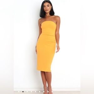 Orange bodycon dress, used once. Condition is like brand new. True to size